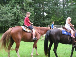 Charlie got to ride a horse at Allene's birthday party!  Amy & Ron's neighbors/friends, Jesse & Holly, have horses and brought them down for the kids to ride.