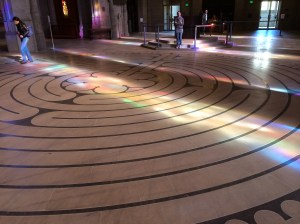 People walk this labyrinth in the back of the cathedral sanctuary. A sign in front of the church advertised their yoga classes on the labyrinth.