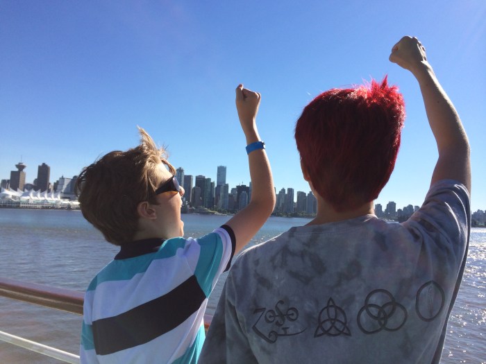 Charlie likes to make the fist pose and insist that Laurel do the same.  This is on the ship as we left Vancouver.